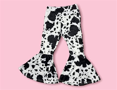 Step Out in Style with Trendy Plus Size Cow Print Bell Bottoms